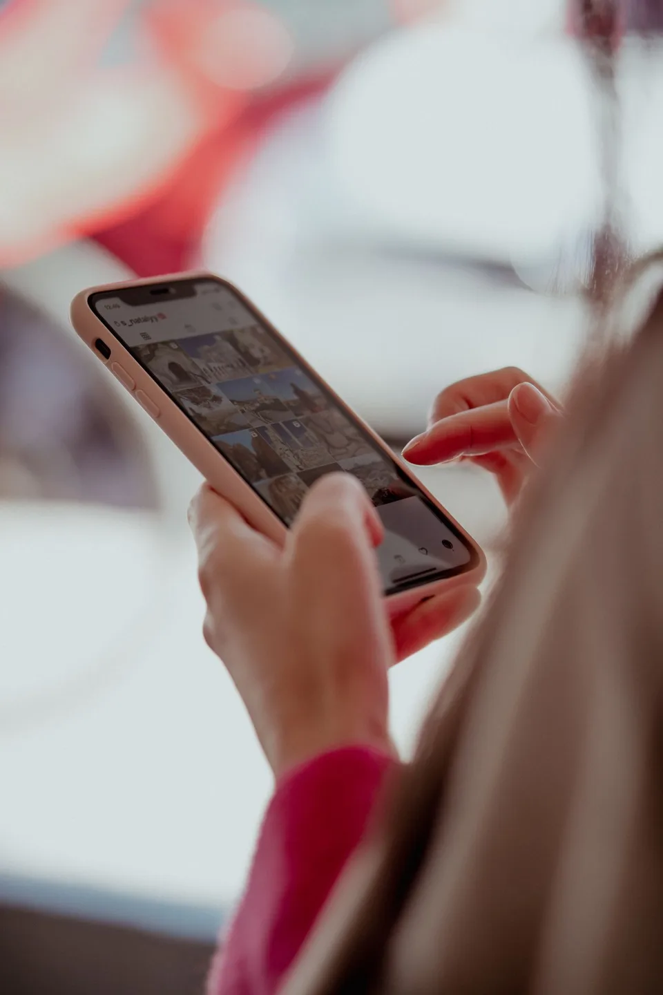 Hands using a smartphone to review information